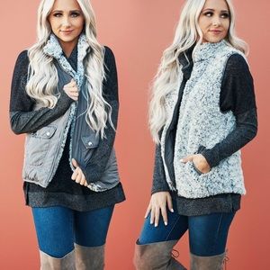 Entro reversible Tan vest with Sherpa interior. Size Large